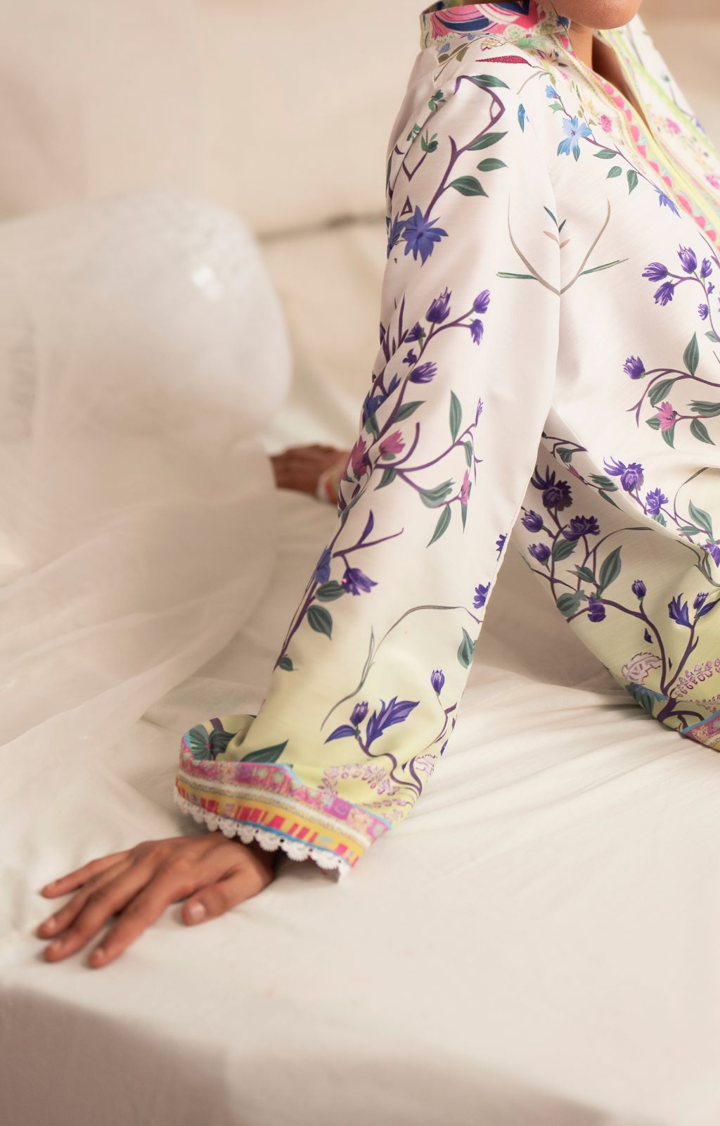 Floral-patterned pajama set on a white background