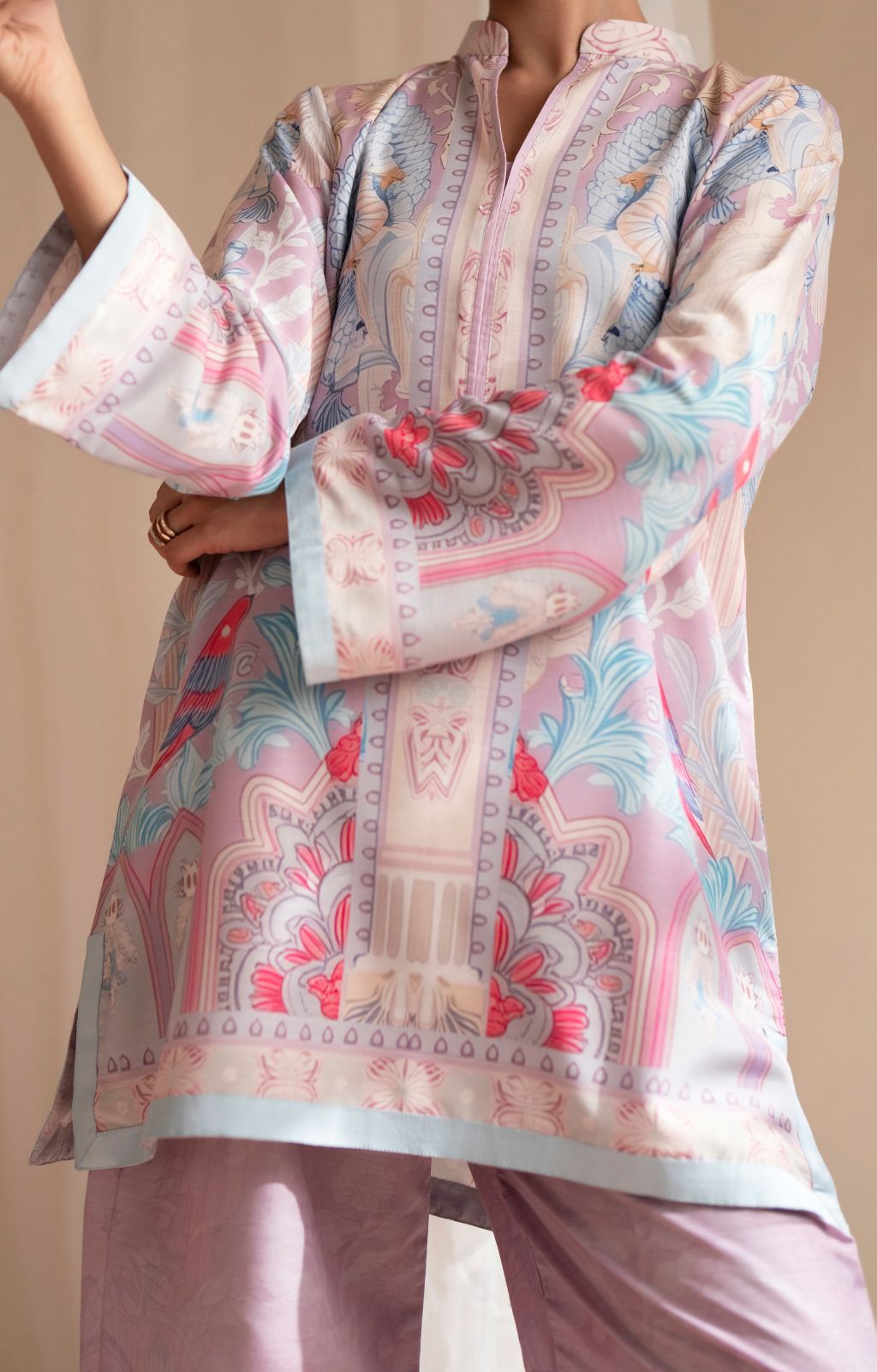 Patterned shirt with floral design on a beige background